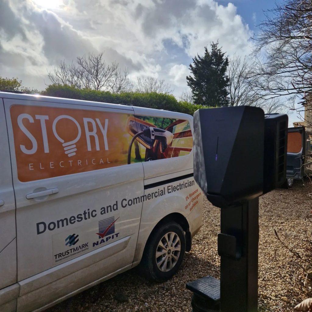 Electric vehicle charger installation by Story Electrical, with our branded work van visible